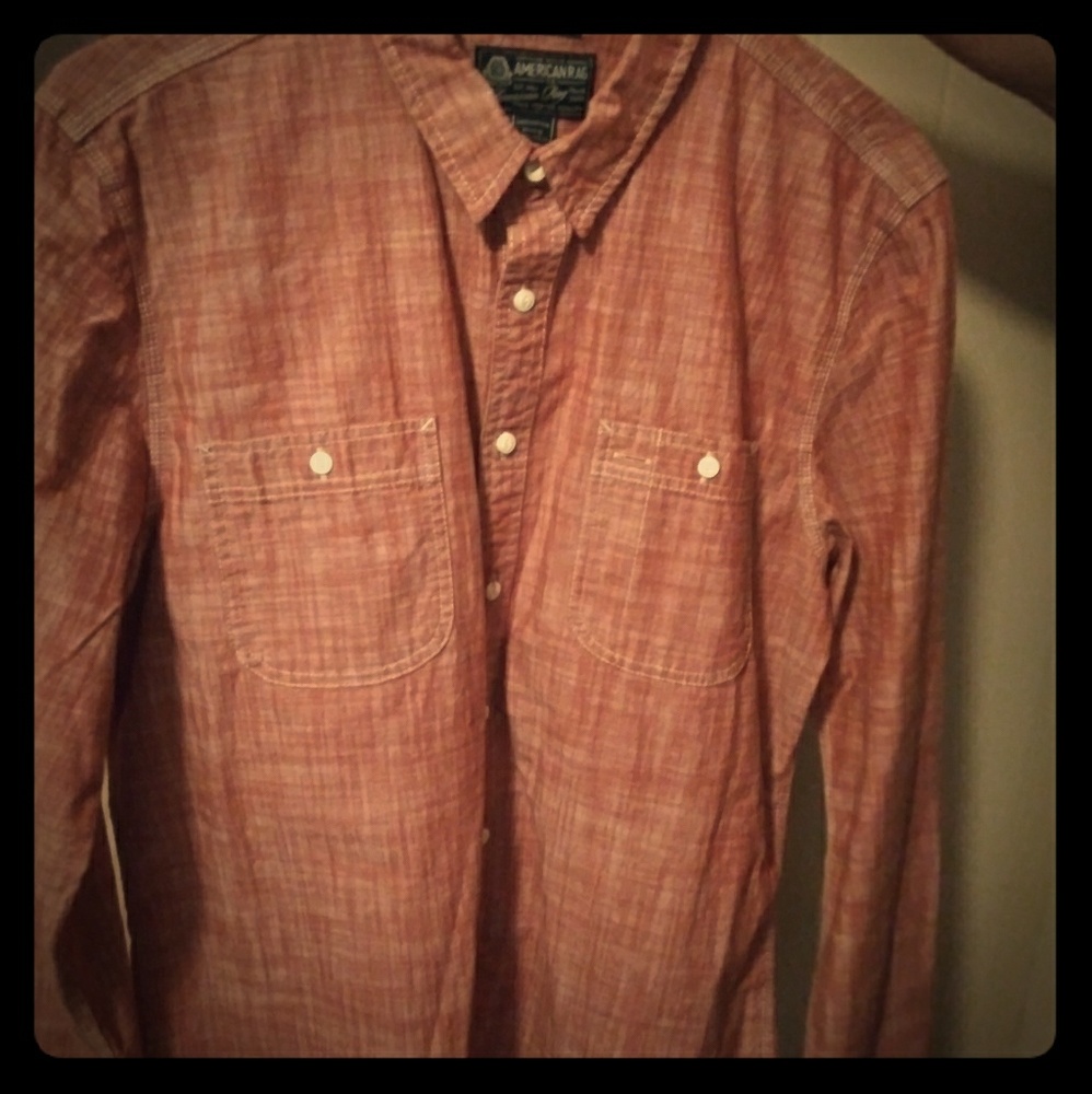 American Rag, never worn. Long sleeve button up